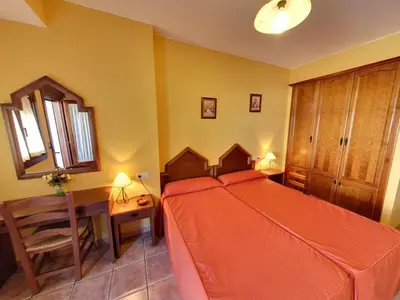 Cama o camas de una habitación en Hotel Rural Pepe Alvarez