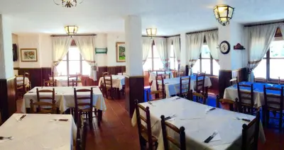 Un restaurante o sitio para comer en Hotel Rural Pepe Alvarez