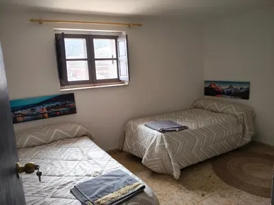 Cama o camas de una habitación en La posada del Mozarabe