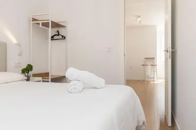 Cama o camas de una habitación en El Cable Apartament- A estrenar, apartamento céntrico y cerca de la playa