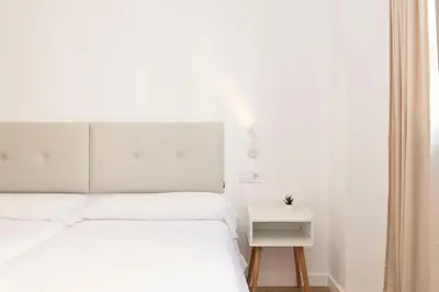 Cama o camas de una habitación en El Cable Apartament- A estrenar, apartamento céntrico y cerca de la playa