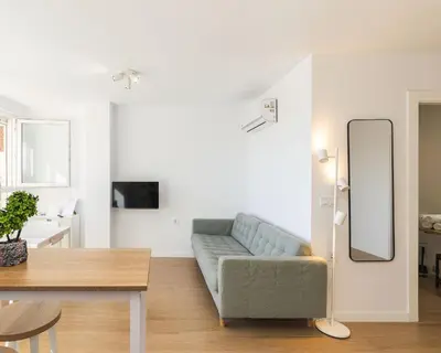 Una televisión o centro de entretenimiento en El Cable Apartament- A estrenar, apartamento céntrico y cerca de la playa