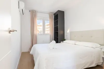 Cama o camas de una habitación en El Cable Apartament- A estrenar, apartamento céntrico y cerca de la playa