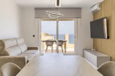 Una televisión o centro de entretenimiento en Mojacar Fantásticas Vistas al Mar Piscina Wifi
