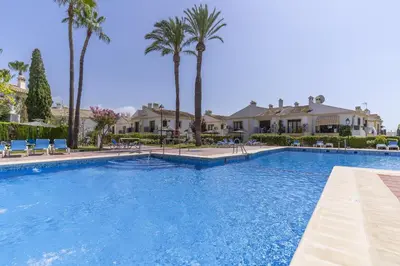 Piscina en o cerca de Vera Coast Fantástico Bajo con Jardin y Piscina