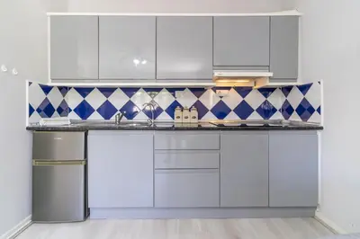 Una cocina o zona de cocina en Vera Coast Fantástico Bajo con Jardin y Piscina