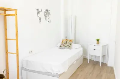 Cama o camas de una habitación en TrendyHomes El Faro de Almería