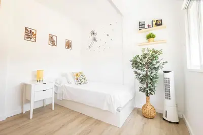 Cama o camas de una habitación en TrendyHomes El Faro de Almería