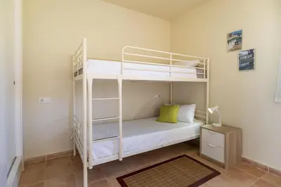 Cama o camas de una habitación en Brisa del Valle Casa con Jardín Piscina Parking