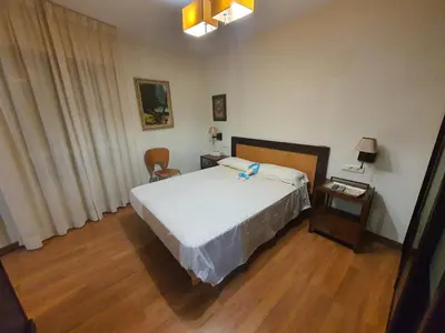 Cama o camas de una habitación en Ático con amplia terraza en Almería