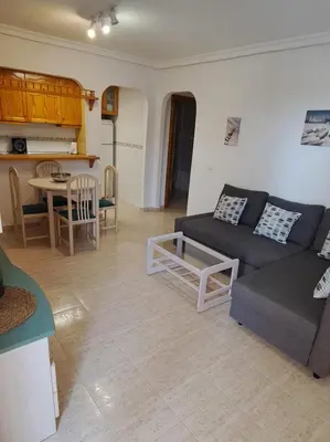 Una cocina o zona de cocina en Ático con vistas al mar