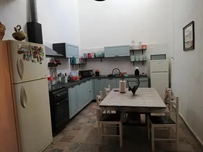 Una cocina o zona de cocina en Villa CHELO