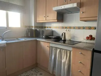 Una cocina o zona de cocina en Inviting holiday home with pool