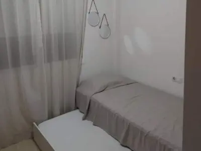 Cama o camas de una habitación en Inviting holiday home with pool