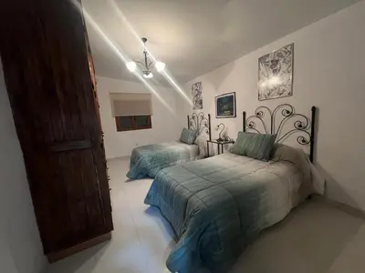 Cama o camas de una habitación en Casa -Cueva Paraje De Los Majuelos