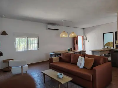 Zona de estar de La casita del desierto, cortijo para 7 personas con piscina privada