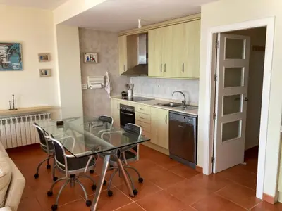 Una cocina o zona de cocina en Penthouse with ocean and mountain views