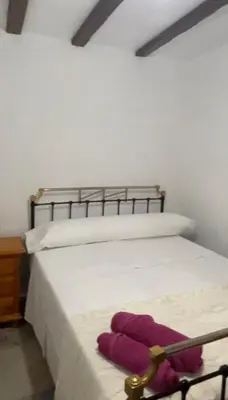 Cama o camas de una habitación en Apartamento rural Zújar