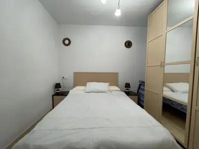 Cama o camas de una habitación en Apartment in Roquetas near the beach