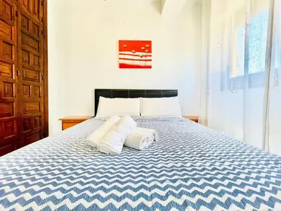 Cama o camas de una habitación en Mountain-View Apartment by Sea