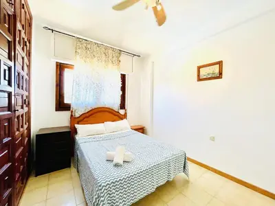 Cama o camas de una habitación en Mountain-View Apartment by Sea