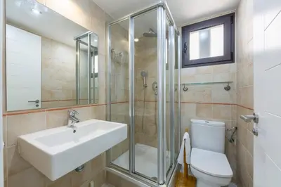 Un baño de Resort Macenas #SeaViewApartment #TerraceAndSunbeds #2BR