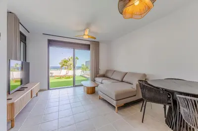 Zona de estar de Resort Macenas #SeaViewApartment #TerraceAndSunbeds #2BR