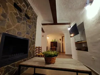 Una televisión o centro de entretenimiento en Casa-cueva 'MI ABUELA L O L A'