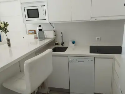 Una cocina o zona de cocina en Sueños del Mediterraneo Estudio
