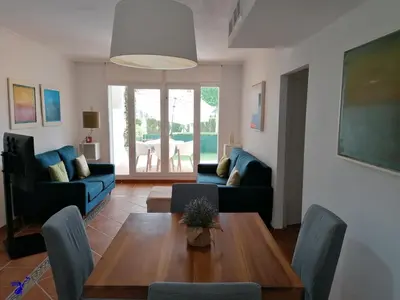 Zona de estar de Ground floor apt with terrace in front of the pool