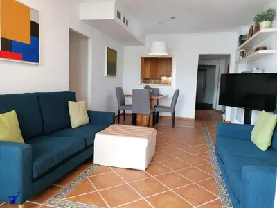 Zona de estar de Ground floor apt with terrace in front of the pool