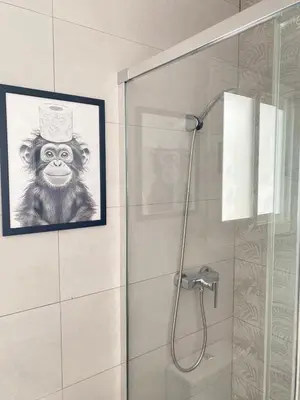 Un baño de Apartamentos SOL y ARENA