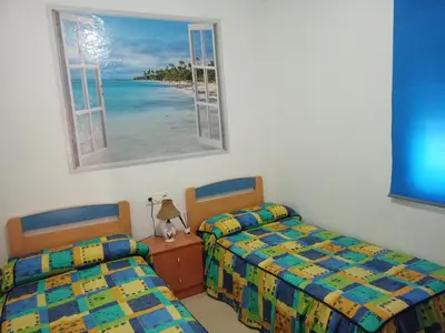 Cama o camas de una habitación en Apartamento en roquetas de mar