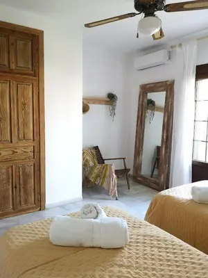 Cama o camas de una habitación en Vera Brisa-Adosado frente al mar
