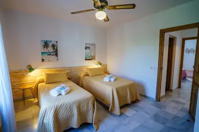 Cama o camas de una habitación en Vera Brisa-Adosado frente al mar