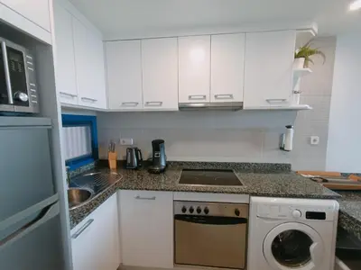 Una cocina o zona de cocina en Casa con vista al mar