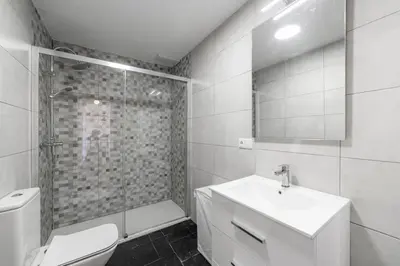 Un baño de LUXURY HOMEs MOJACAR PUEBLO WITH PANORAMIC VIEWS A POOL JACUZZI AND ROOFTOP GYM