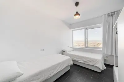 Cama o camas de una habitación en LUXURY HOMEs MOJACAR PUEBLO WITH PANORAMIC VIEWS A POOL JACUZZI AND ROOFTOP GYM