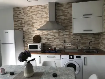 Una cocina o zona de cocina en El Rincón de Agua Amarga lll