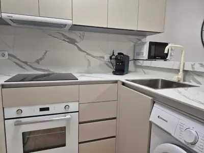 Una cocina o zona de cocina en Le Panorama