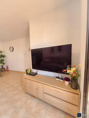 Una televisión o centro de entretenimiento en Le Panorama