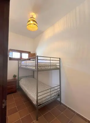 Cama o camas de una habitación en Camping Almocita-Alpujarra