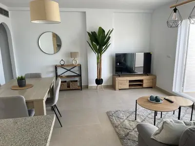 Una televisión o centro de entretenimiento en Welcome to your stylish home