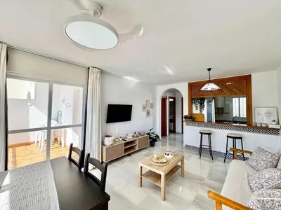 Una televisión o centro de entretenimiento en Apartment by Playa Serena & Golf Views