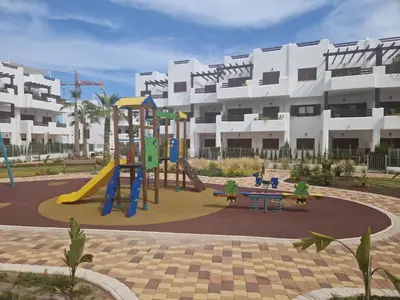 Zona de juegos infantil en Apartamento moderno con piscina, a 500m de la playa, San Juan de los Terreros - ES-376-41