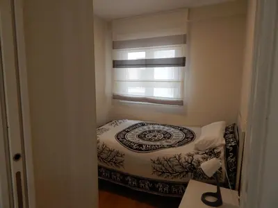 Cama o camas de una habitación en Ciudad y Mar - Piso luminoso y céntrico