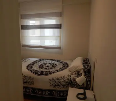 Cama o camas de una habitación en Ciudad y Mar - Piso luminoso y céntrico