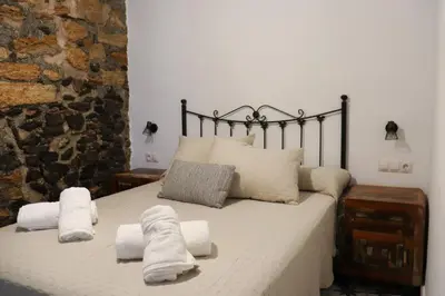 Cama o camas de una habitación en La Cuadra