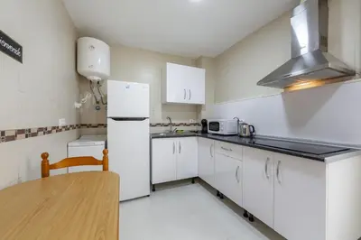 Una cocina o zona de cocina en AlmeriaSuite Sabinar Beach
