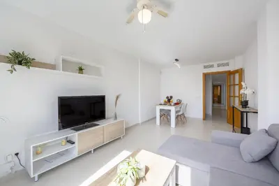 Una televisión o centro de entretenimiento en AlmeriaSuite Sabinar Beach